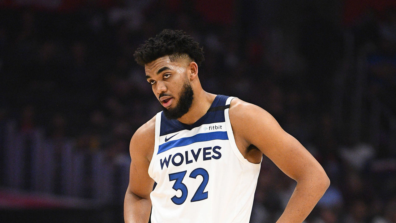 LOS ANGELES, CA - FEBRUARY 01: Minnesota Timberwolves Center Karl-Anthony Towns (32) looks on during a NBA game between the Minnesota Timberwolves and the Los Angeles Clippers on February 1, 2020 at STAPLES Center in Los Angeles, CA.