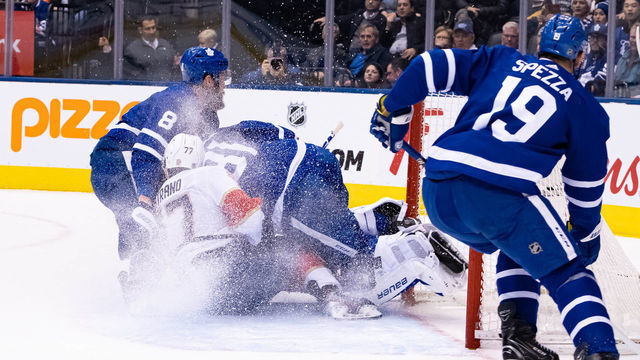 TORONTO, ON - FEBRUARY 03: Florida Panthers Left Wing Frank Vatrano (77) crashes into Toronto Maple Leafs Goalie Frederik Andersen (31) during the first period of the NHL regular season game between the Florida Panthers and the Toronto Maple Leafs on February 3, 2020, at Scotiabank Arena in Toronto, ON, Canada.