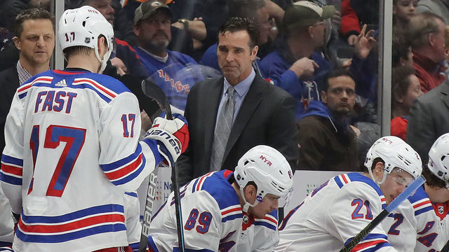 UNIONDALE, NEW YORK - JANUARY 16: David Quinn, head coach of the New York Rangers, handles bench duties against the New York Islanders at NYCB Live's Nassau Coliseum on January 16, 2020 in Uniondale, New York. The Rangers defeated the Islanders 2-1.