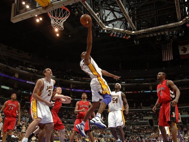 LOS ANGELES - JANUARY 22: Kobe Bryant #8 of the Los Angeles Lakers gets to the hoop against the Toronto Raptors on January 22, 2006 at Staples Center in Los Angeles, California. Bryant scored 81 points in the Lakers 122-104 win over the Raptors. NOTE TO USER: User expressly acknowledges and agrees that, by downloading and/or using this Photograph, user is consenting to the terms and conditions of the Getty Images License Agreement. Mandatory Copyright Notice: Copyright 2006 NBAE