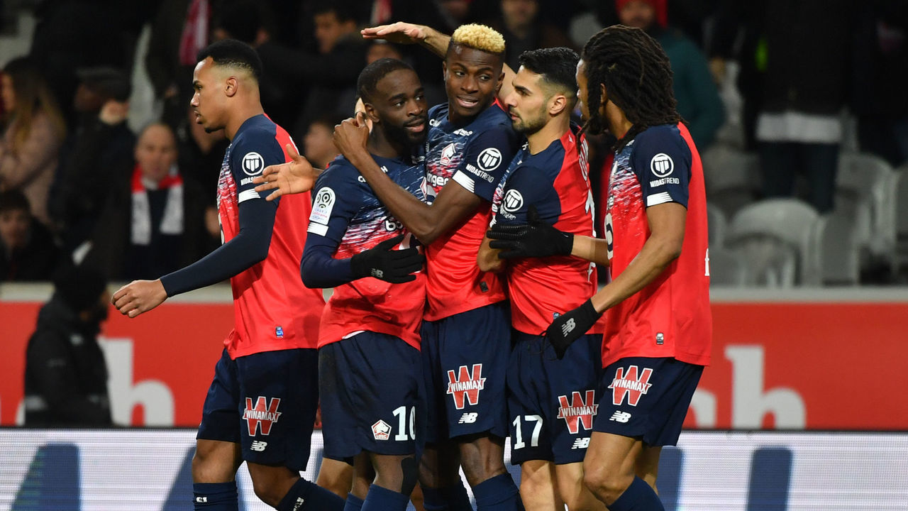 Lille's players celebrate after scoring a goal during the French L1 football match between Lille (LOSC) and Rennes at the Pierre-Mauroy stadium in Villeneuve d'Ascq, near Lille, northern France, on February 4 2020.