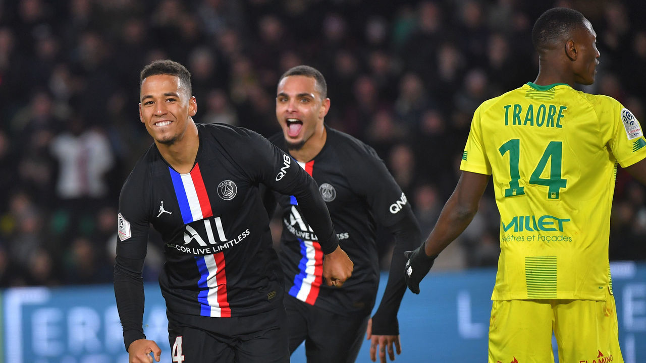 Paris Saint-Germain's German defender Thilo Kehrer (L) celebrates after scoring a goal during the French L1 football match between Nantes (FCNA) and Paris Saint-Germain (PSG) on February 4, 2020 at La Baujeoire stadium in Nantes, western France.