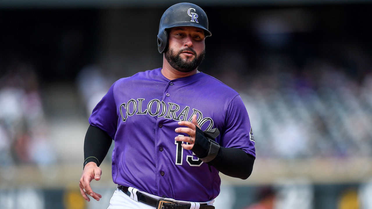 DENVER, CO - AUGUST 14: Yonder Alonso #13 of the Colorado Rockies runs the bases against the Arizona Diamondbacks at Coors Field on August 14, 2019 in Denver, Colorado.