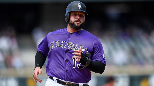 DENVER, CO - AUGUST 14: Yonder Alonso #13 of the Colorado Rockies runs the bases against the Arizona Diamondbacks at Coors Field on August 14, 2019 in Denver, Colorado.