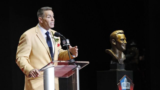 CANTON, OH - AUGUST 05: Kurt Warner speaks while standing beside his bust during the Pro Football Hall of Fame Enshrinement Ceremony at Tom Benson Hall of Fame Stadium on August 5, 2017 in Canton, Ohio.