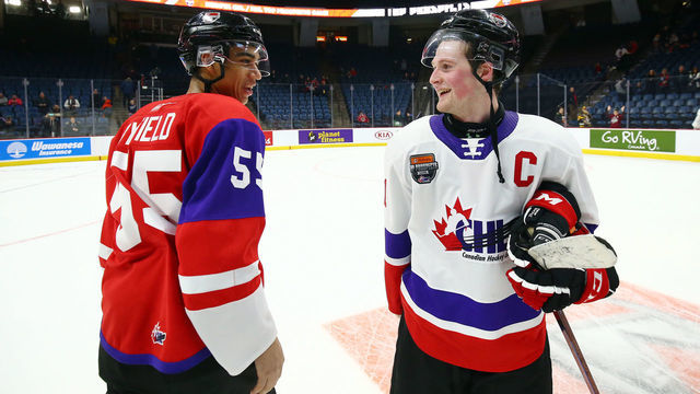 HAMILTON, ON - JANUARY 16: Alexis Lafreniere #11 of Team White and Quinton Byfield #55 of Team Red talk following the final whistle of the 2020 CHL/NHL Top Prospects Game at FirstOntario Centre on January 16, 2020 in Hamilton, Canada.