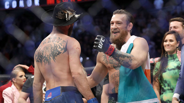 LAS VEGAS, NEVADA - JANUARY 18: Conor McGregor hugs Donald Cerrone after his first round TKO victory in their welterweight bout during UFC246 at T-Mobile Arena on January 18, 2020 in Las Vegas, Nevada.