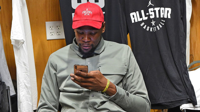 CHARLOTTE, NC - FEBRUARY 16: Kevin Durant #35 of Team LeBron gets ready in the locker room before the 2019 NBA All-Star Practice and Media Availability on February 16, 2019 at Bojangles Coliseum in Charlotte, North Carolina. Mandatory Copyright Notice: Copyright 2019 NBAE