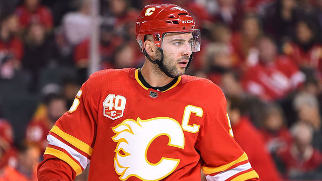 CALGARY, AB - JANUARY 09: Calgary Flames Defenceman Mark Giordano (5) looks on between plays during the first period of an NHL game where the Calgary Flames hosted the Minnesota Wild on January 9, 2020, at the Scotiabank Saddledome in Calgary, AB.