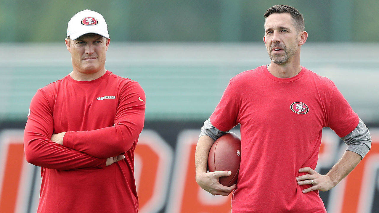 CORAL GABLES, FLORIDA - JANUARY 29: Head coach Kyle Shanahan of the San Francisco 49ers (R) talks with general manager John Lynch during practice for Super Bowl LIV at the Greentree Practice Fields on the campus of the University of Miami on January 29, 2020 in Coral Gables, Florida.