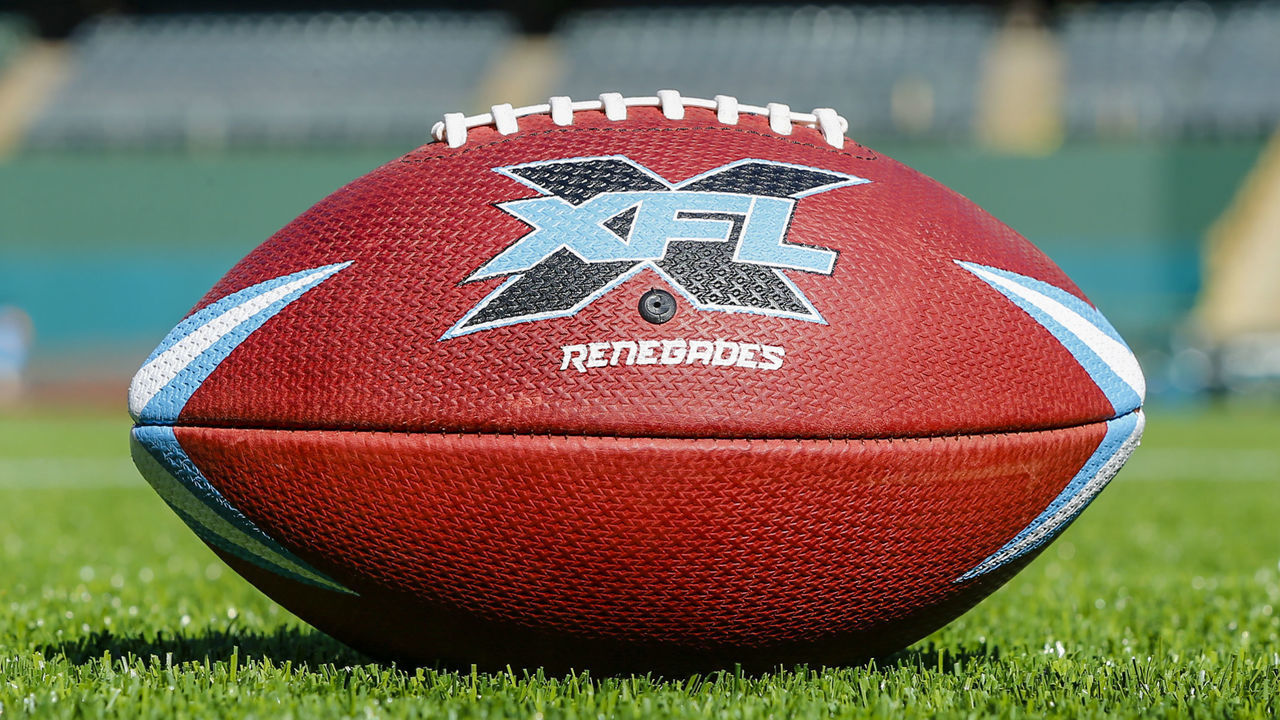 ARLINGTON, TX - FEBRUARY 01: A Dallas Renegades football lays in the grass during the open practice for the XFL Dallas Renegades on February 1, 2020 at Globe Life Park in Arlington, Texas.