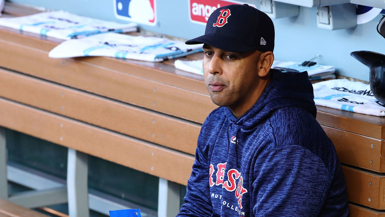 ANAHEIM, CA - APRIL 19: Manager Alex Cora #20 of the Boston Red Sox sits in the dugout prior to the MLB game against the Los Angeles Angels of Anaheim at Angel Stadium on April 19, 2018 in Anaheim, California. The Red Sox defeated the Angels 8-2.