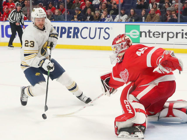 BUFFALO, NY - FEBRUARY 6: Jonathan Bernier #45 of the Detroit Red Wings makes a shootout save against Sam Reinhart #23 of the Buffalo Sabres during an NHL game on February 6, 2020 at KeyBank Center in Buffalo, New York. Detroit won 4-3 in a shootout.