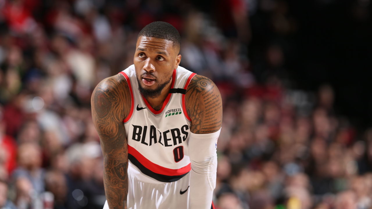 PORTLAND, OR - FEBRUARY 6: Damian Lillard #0 of the Portland Trail Blazers looks on during a game against the San Antonio Spurs on February 6, 2020 at the Moda Center Arena in Portland, Oregon. Mandatory Copyright Notice: Copyright 2020 NBAE