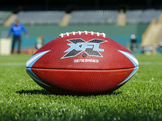 ARLINGTON, TX - FEBRUARY 01: A Dallas Renegades football lays in the grass during the open practice for the XFL Dallas Renegades on February 1, 2020 at Globe Life Park in Arlington, Texas.