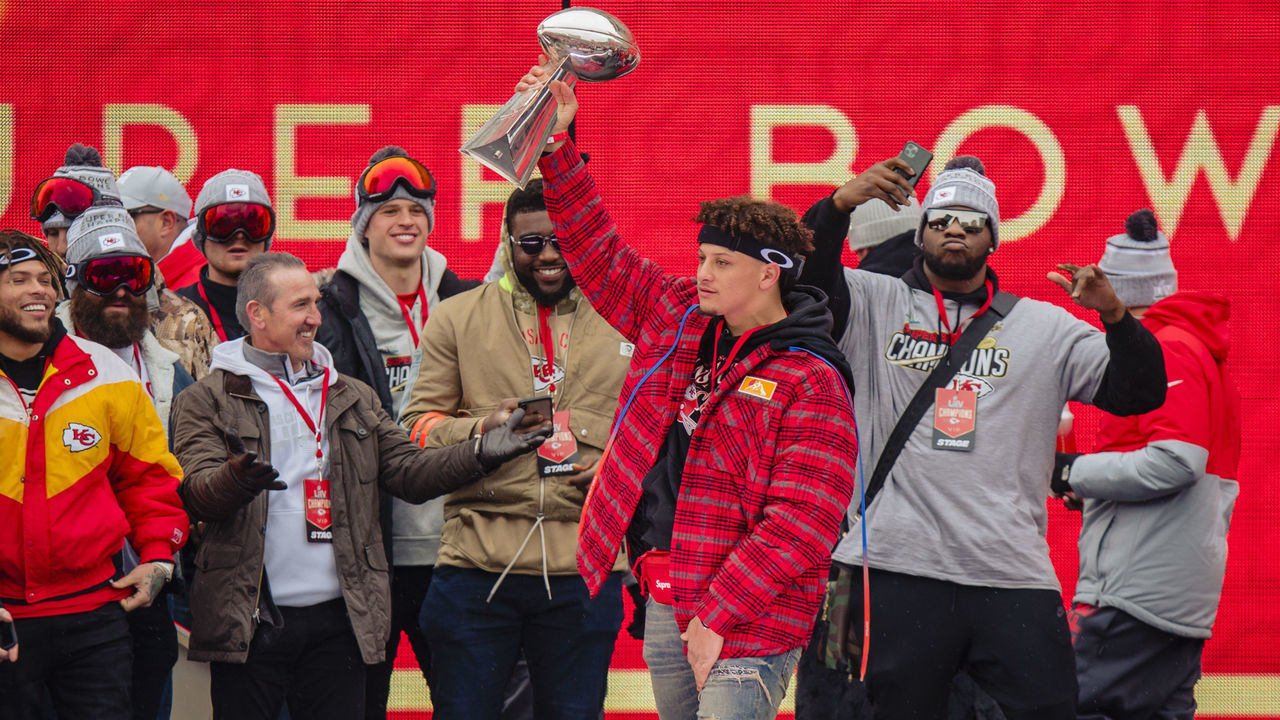 KANSAS CITY, MO - FEBRUARY 05: Members of the Kansas City Chiefs celebrate on stage with the Vince Lombardi Trophy during the Kansas City Chiefs Victory Parade on February 5, 2020 in Kansas City, Missouri.