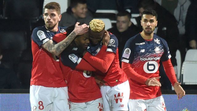Lille's Portuguese midfielder Renato Sanches (2nd L) celebrates scoring his team's second goal during the French L1 Football match between Angers SCO and Lille (LOSC), at the Raymond-Kopa Stadium, in Angers, northwestern France on Febuary 7, 2020.