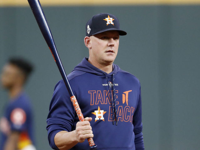 HOUSTON, TEXAS - OCTOBER 29: AJ Hinch #14 of the Houston Astros looks on during batting practice prior to Game Six of the 2019 World Series against the Washington Nationals at Minute Maid Park on October 29, 2019 in Houston, Texas.