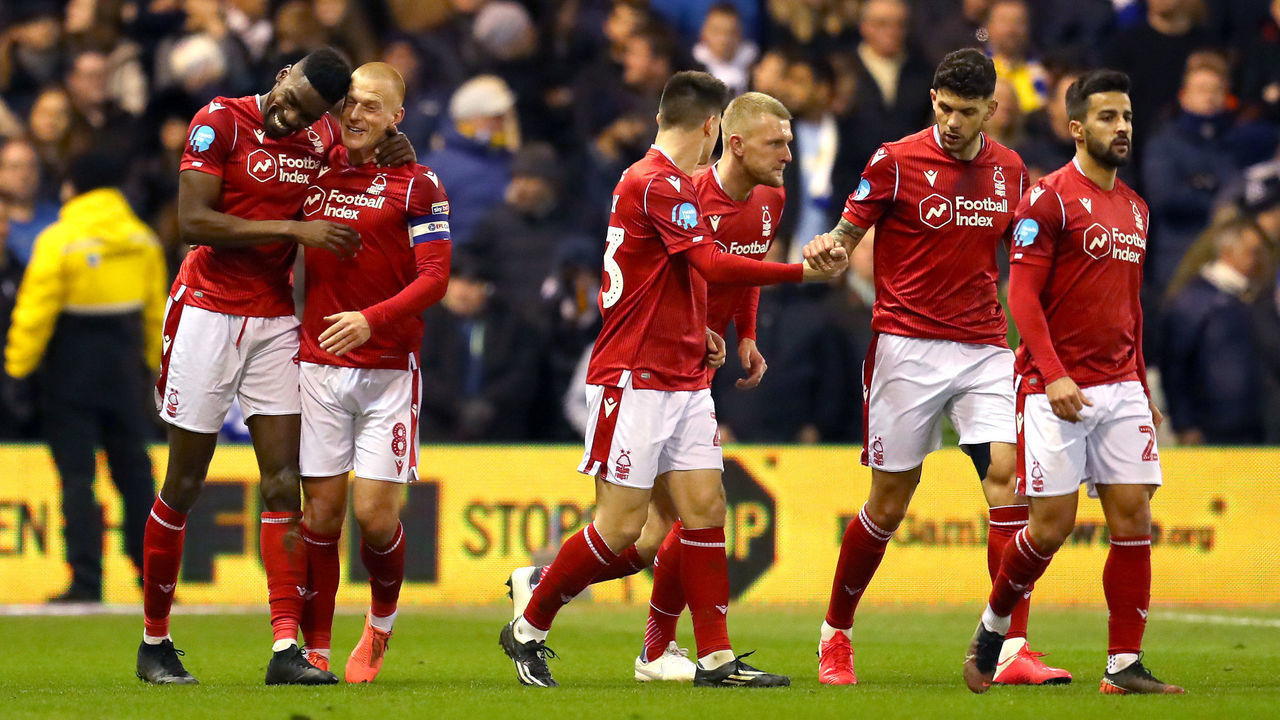 NOTTINGHAM, ENGLAND - FEBRUARY 08: Sammy Ameobi of Nottingham Forest celebrates with Ben Watson and teammates after scoring his team's first goal during the Sky Bet Championship match between Nottingham Forest and Leeds United at City Ground on February 08, 2020 in Nottingham, England.