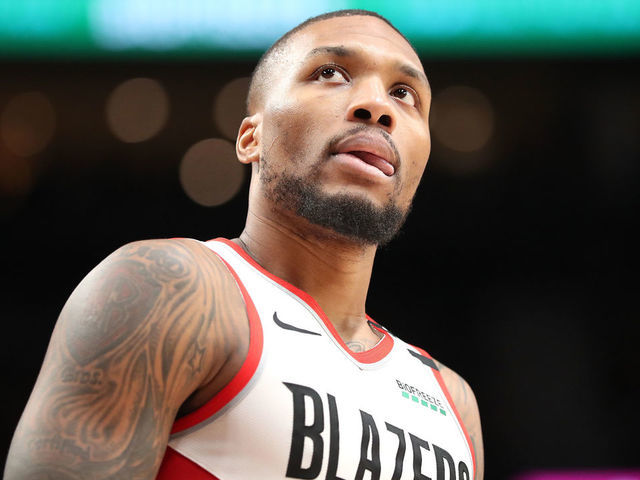 PORTLAND, OREGON - FEBRUARY 01: Damian Lillard #0 of the Portland Trail Blazers reacts in the third quarter against the Utah Jazz during their game at Moda Center on February 01, 2020 in Portland, Oregon.