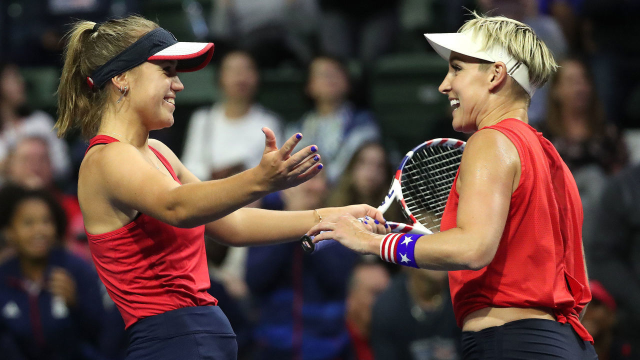 EVERETT, WASHINGTON - FEBRUARY 08: Sofia Kenin of USA (L) and Bethanie Mattek-Sands of USA celebrate after defeating Anastasija Sevastova of Latvia and Jelena Ostapenko of Latvia in the women's doubles to advance Team USA in the 2020 Fed Cup qualifier at Angel of the Winds Arena on February 08, 2020 in Everett, Washington.