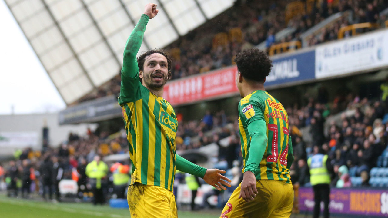LONDON, ENGLAND - FEBRUARY 09: Filip Krovinovic of West Bromwich Albion celebrates with Matheus Pereira after scoring his team's first goal during the Sky Bet Championship match between Millwall and West Bromwich Albion at The Den on February 09, 2020 in London, England.