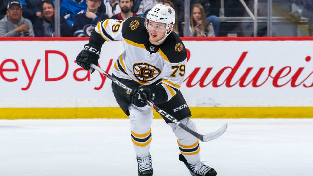 WINNIPEG, MB - JANUARY 31: Jeremy Lauzon #79 of the Boston Bruins follows the play down the ice during third period action against the Winnipeg Jets at the Bell MTS Place on January 31, 2020 in Winnipeg, Manitoba, Canada. The Bruins defeated the Jets 2-1.