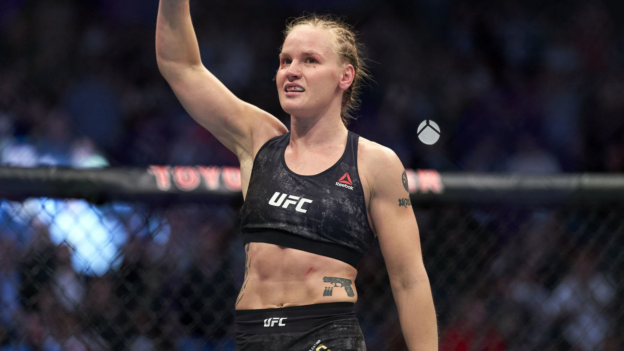 HOUSTON, TEXAS - FEBRUARY 08: Valentina Shevchenko of Kyrgyzstan celebrates her TKO victory over Katlyn Chookagian in their women's flyweight championship bout during the UFC 247 event at Toyota Center on February 08, 2020 in Houston, Texas.
