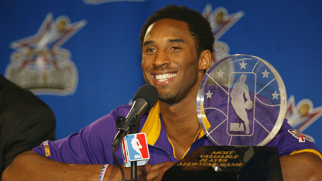 10 Feb 2002: Kobe Bryant of the Los Angeles Lakes meets with the media with his game MVP Trophy by his side after the NBA All-Star 2002 game at the First Union Center in Philadelphia, Pennsylvania. DIGITAL IMAGE NOTICE TO USER: User expressly acknowledges and agrees that, by downloading and/or using this Photograph, user is consenting to the terms and conditions of the Getty Images License Agreement. Mandatory Copyright notice: Copyright 2002 NBAE Mandatory Credit: David Sherman/NBAE/Getty Images