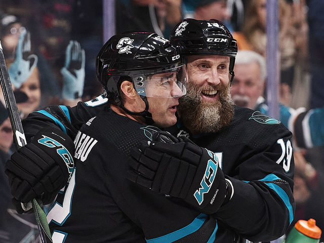 SAN JOSE, CA - DECEMBER 27: San Jose Sharks center Patrick Marleau (12) and Joe Thornton (19) celebrate Thorntons second-period goal during the San Jose Sharks game versus the Los Angeles Kings on December 27, 2019, at SAP Center at San Jose in San Jose, CA