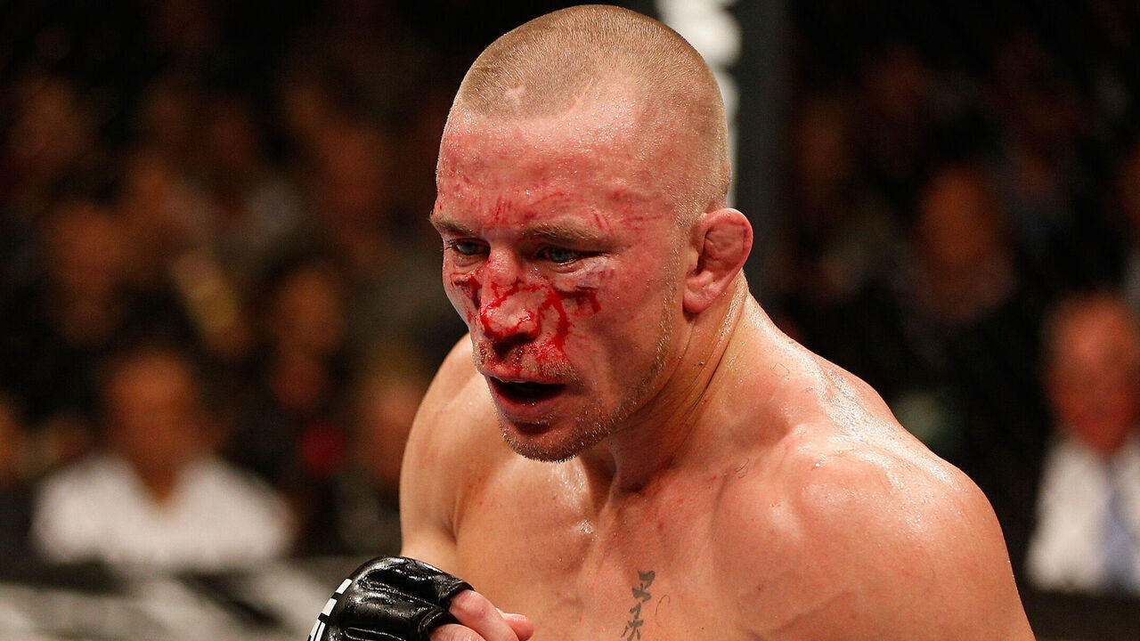 LAS VEGAS, NV - NOVEMBER 16: Georges St-Pierre stands in the Octagon during his UFC welterweight championship bout against Johny Hendricks during the UFC 167 event inside the MGM Grand Garden Arena on November 16, 2013 in Las Vegas, Nevada.