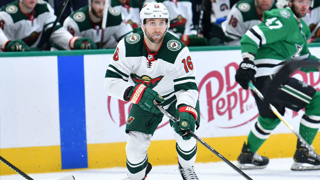 DALLAS, TX - FEBRUARY 7: Jason Zucker #16 of the Minnesota Wild handles the puck against the Dallas Stars at the American Airlines Center on February 7, 2020 in Dallas, Texas.