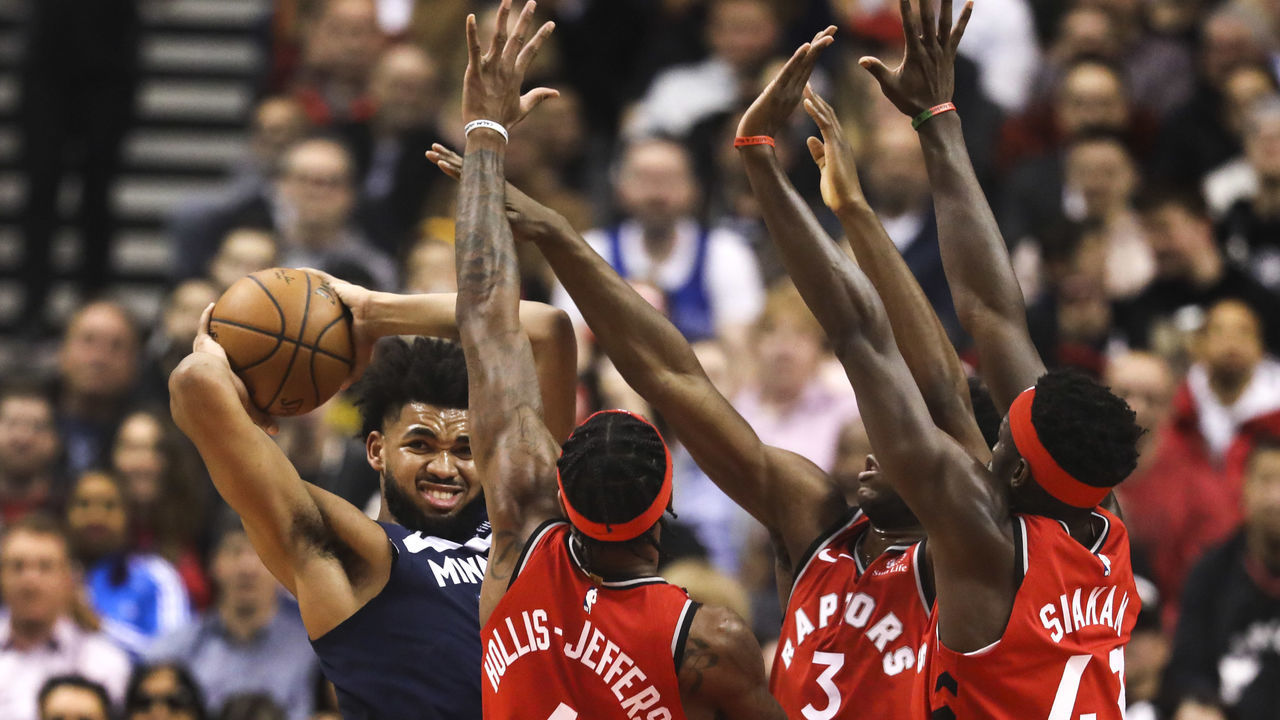 TORONTO, ON - February 10 In the first half, Minnesota Timberwolves center Karl-Anthony Towns (32) comes across some heavy Raptors defence. The Toronto Raptors took on the Minnesota Timberwolves at the Scotiabank arena in NBA basketball action. February 10, 2020 (Richard Lautens/Toronto Star via Getty Images)