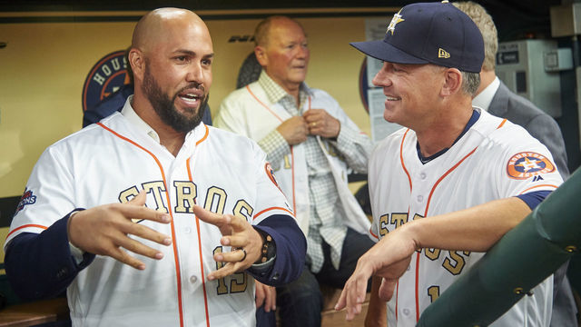 HOUSTON, TX - APRIL 3: Former Houston Astro Carlos Beltran visits with Astros manager AJ Hinch #14 before receiving their World Series Championship rings before the first pitch against the Baltimore Orioles at Minute Maid Park on Monday, April 3, 2018 in Houston, Texas.