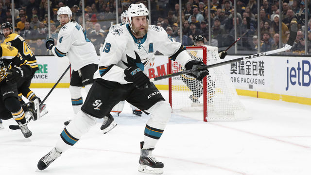 BOSTON, MA - FEBRUARY 26: San Jose Sharks center Joe Thornton (19) chases the puck during a game between the Boston Bruins and the San Jose Sharks on February 26, 2019, at TD Garden in Boston, Massachusetts.