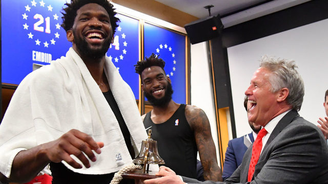 PHILADELPHIA, PA - DECEMBER 25: Joel Embiid #21, and Head Coach Brett Brown of the Philadelphia 76ers are seen in the locker room after the game against the Milwaukee Bucks on December 25, 2019 at the Wells Fargo Center in Philadelphia, Pennsylvania. NOTE TO USER: User expressly acknowledges and agrees that, by downloading and/or using this Photograph, user is consenting to the terms and conditions of the Getty Images License Agreement. Mandatory Copyright Notice: Copyright 2019 NBAE