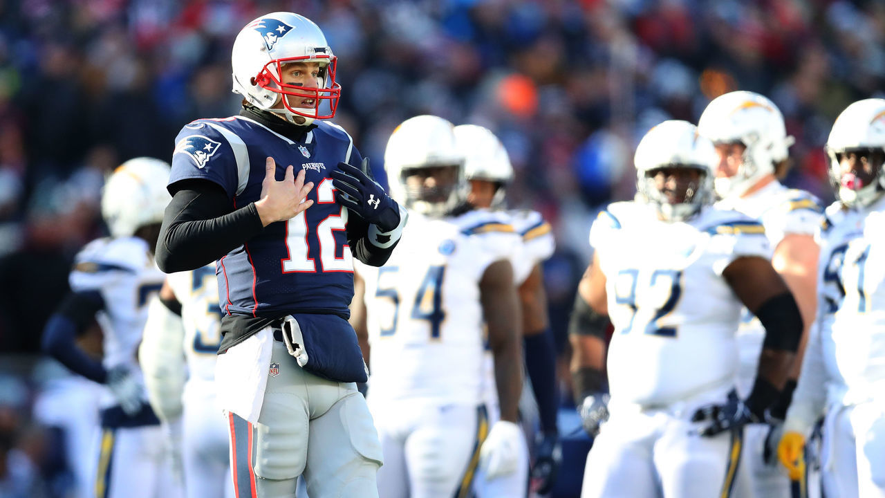 FOXBOROUGH, MASSACHUSETTS - JANUARY 13: Tom Brady #12 of the New England Patriots reacts during the second quarter in the AFC Divisional Playoff Game against the Los Angeles Chargers at Gillette Stadium on January 13, 2019 in Foxborough, Massachusetts.
