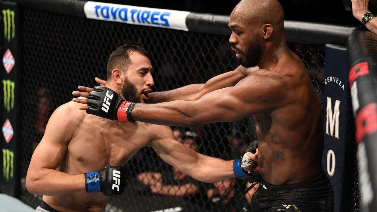HOUSTON, TEXAS - FEBRUARY 08: (L-R) Dominick Reyes punches Jon Jones in their light heavyweight championship bout during the UFC 247 event at Toyota Center on February 08, 2020 in Houston, Texas.