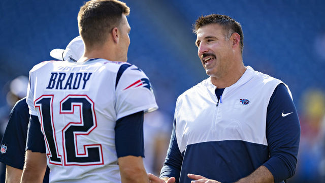 NASHVILLE, TN - AUGUST 17: Tom Brady #12 of the New England Patriots talks with Head Coach Mike Vrabel of the Tennessee Titans before the game during week two of the preseason at Nissan Stadium on August 17, 2019 in Nashville, Tennessee. The Patriots defeated the Titans 22-17.