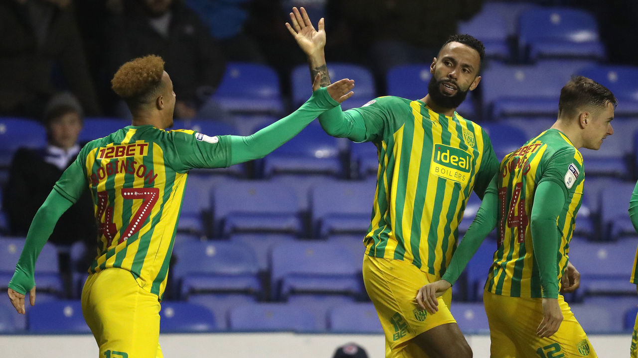 READING, ENGLAND - FEBRUARY 12: Kyle Bartley of West Bromwich Albion celebrates after scoring a goal to make it 1-2 with Callum Robinson during the Sky Bet Championship match between Reading and West Bromwich Albion at Madejski Stadium on February 12, 2020 in Reading, England.