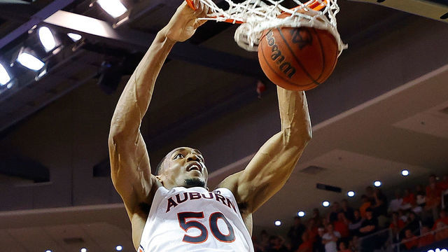 AUBURN, ALABAMA - FEBRUARY 12: Austin Wiley #50 of the Auburn Tigers dunks in overtime against the Alabama Crimson Tide at Auburn Arena on February 12, 2020 in Auburn, Alabama.