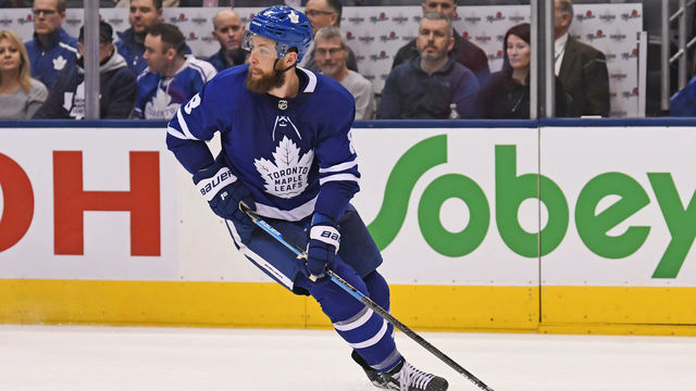 TORONTO, ON - FEBRUARY 11: Toronto Maple Leafs Defenceman Jake Muzzin (8) controls the puck during the regular season NHL game between the Arizona Coyotes and Toronto Maple Leafs on February 11, 2019 at Scotiabank Arena in Toronto, ON.
