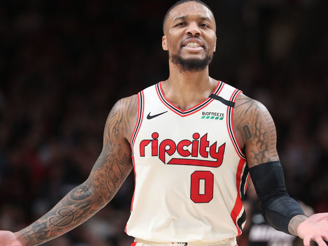 PORTLAND, OREGON - FEBRUARY 09: Damian Lillard #0 of the Portland Trail Blazers reacts to a call in the third quarter against the Miami Heat during their game at Moda Center on February 09, 2020 in Portland, Oregon.