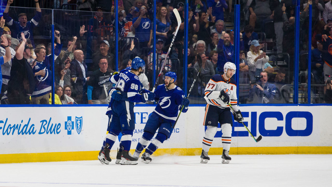 TAMPA, FL - FEBRUARY 13: Mikhail Sergachev #98, Cedric Paquette #13, Yanni Gourde #37 of the Tampa Bay Lightning celebrate a goal against Oscar Klefbom #77 of the Edmonton Oilers during the second period at Amalie Arena on February 13, 2020 in Tampa, Florida.