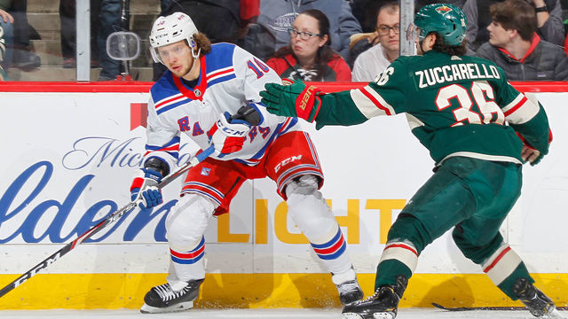 SAINT PAUL, MN - FEBRUARY 13: Mats Zuccarello #36 of the Minnesota Wild defends Artemi Panarin #10 of the New York Rangers during the game at the Xcel Energy Center on February 13, 2020 in Saint Paul, Minnesota.