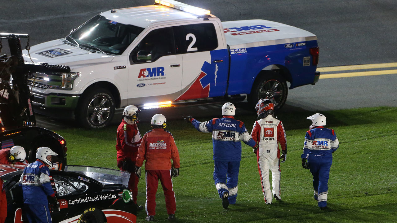 DAYTONA BEACH, FLORIDA - FEBRUARY 13: Daniel Suarez, driver of the #96 Toyota Certified Used Vehicles Toyota, crashes in the infield grass during the NASCAR Cup Series Bluegreen Vacations Duel 1 at Daytona International Speedway on February 13, 2020 in Daytona Beach, Florida.