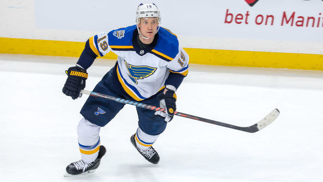 WINNIPEG, MANITOBA - DECEMBER 27: Jay Bouwmeester #19 of the St. Louis Blues keeps an eye on the play during first period action against the Winnipeg Jets at Bell MTS Place on December 27, 2019 in Winnipeg, Canada.