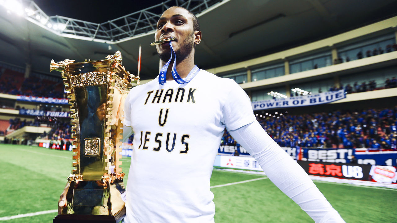 SHANGHAI, CHINA - DECEMBER 06: Odion Ighalo of Shanghai Greenland Shenhua celebrates with champion trophy after winning 2019 Chinese Football Association (CFA) Cup final match between Shanghai Greenland Shenhua and Shandong Luneng Taishan at Shanghai Hongkou Football Stadium on December 6, 2019 in Shanghai, China.