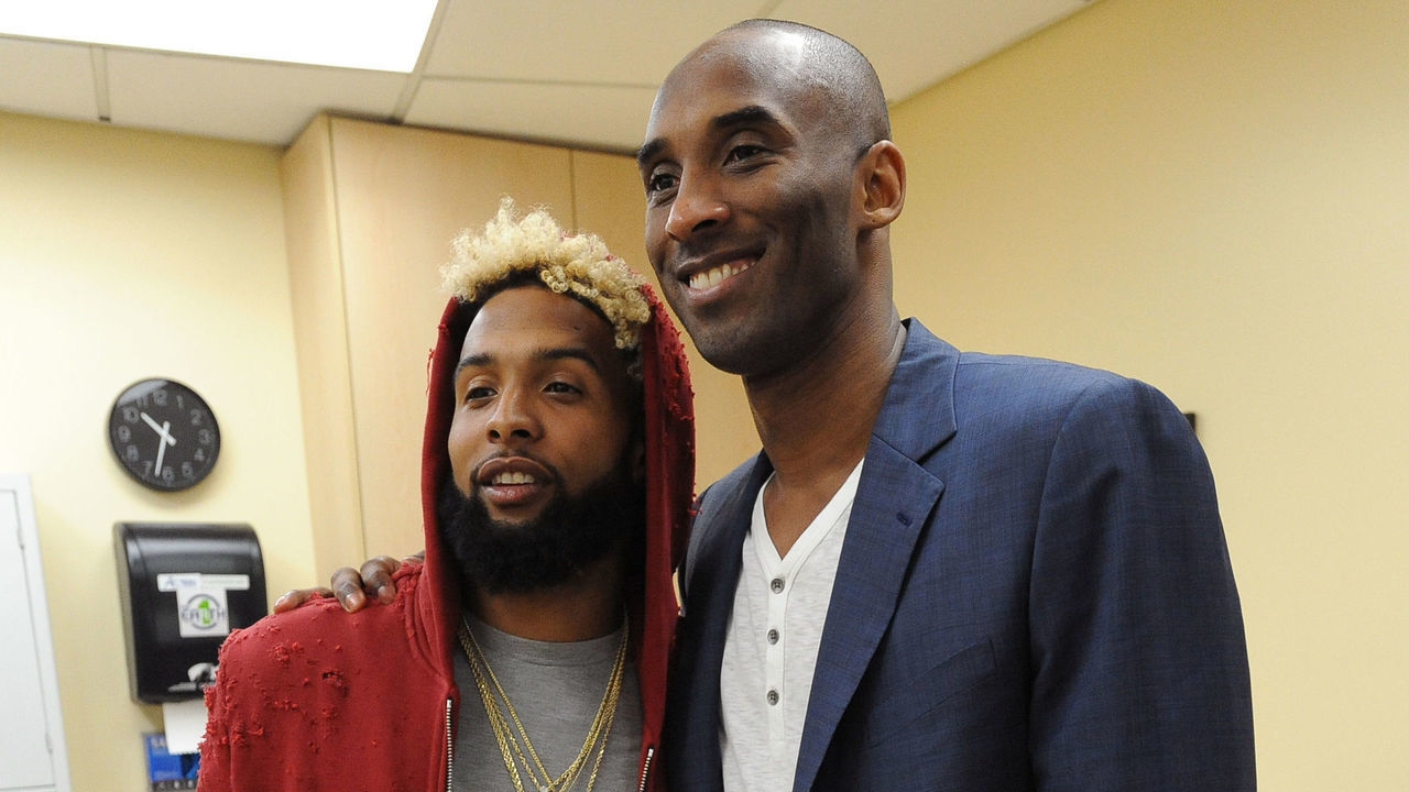 LOS ANGELES, CA - MARCH 25: New York Giant, O'Dell Beckham Jr. poses for a photo with Kobe Bryant #24 of the Los Angeles Lakers after the game against the Denver Nuggets on March 25, 2016 at STAPLES Center in Los Angeles, California. NOTE TO USER: User expressly acknowledges and agrees that, by downloading and/or using this Photograph, user is consenting to the terms and conditions of the Getty Images License Agreement. Mandatory Copyright Notice: Copyright 2016 NBAE