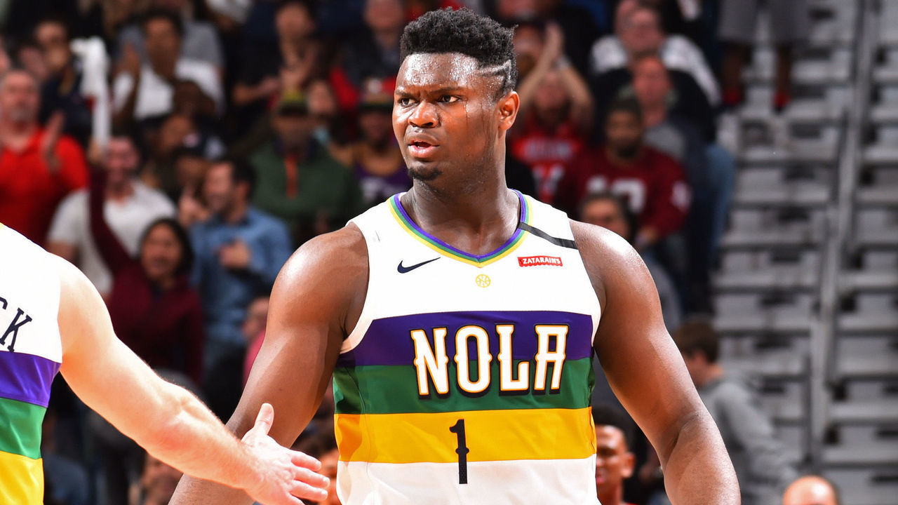 NEW ORLEANS, LA - FEBRUARY 4: JJ Redick #4 of the New Orleans Pelicans high-fives Zion Williamson #1 of the New Orleans Pelicans against the Milwaukee Bucks on February 4, 2020 at the Smoothie King Center in New Orleans, Louisiana. Mandatory Copyright Notice: Copyright 2020 NBAE
